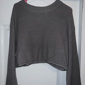 Women’s grey sweater with wide sleeves a little bit cropped